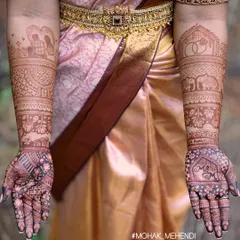This photo shows the full bridal design with its gorgeous, dark stain. Proof that love plus our mehndi equals the deepest color.