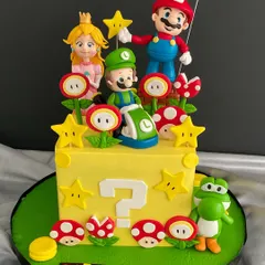 It’s-a me, Mario! This Super Mario cake is pure nostalgia, featuring Mario, Luigi, Princess Peach, and Yoshi on top of a classic question mark block.