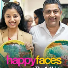 The best part of any workshop is seeing the pride and happiness on everyone's faces. These team members are showing off the functional art plates they designed and painted themselves, creating a memorable and tangible result from their corporate offsite activity.