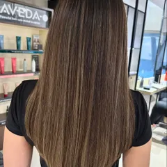 A warm-to-cool tone hair color transformation. I used blended highlights to cover grey and create this beautiful, multi-dimensional blonde on straight hair.