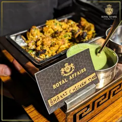 A classic North Indian appetizer, Bhatti Chicken Tikka. Marinated and cooked to perfection, this dish is served with a fresh mint chutney, showcasing my expertise in authentic Indian cuisine.
