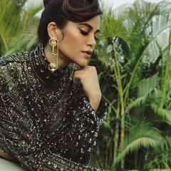 A moment of quiet elegance with Aaditi Pohankar. This look features a soft, smokey eye and a sculpted brow, paired with a vintage-inspired updo.