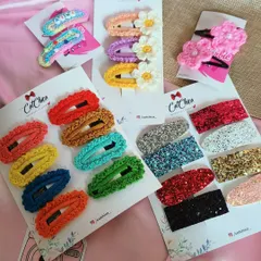 How many clips are too many? We believe you can never have enough! Here's a bunch of our assorted hair clips and barrettes, from crochet to glitter.