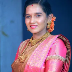 A classic portrait from a family function, showcasing the beautiful traditional attire and gold jewelry. I ensure everyone gets a stunning photo to remember the occasion.