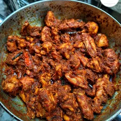 My super spicy chicken stir-fry, cooked in a large wok to get that perfect char and flavor. This is a favorite for those who love a bit of heat.