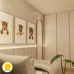 A cute and cozy kids' room with bear-themed artwork and a custom bed.