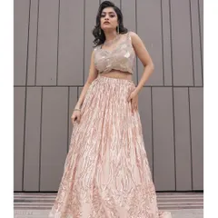 For a modern and glamorous look, this rose gold sequin lehenga is a showstopper. It’s perfect for a sangeet, reception, or any evening celebration where you want to shine.
