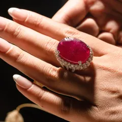 There is nothing as passionate as the deep red of a fine ruby. I set this magnificent stone in a halo of diamonds to amplify its colour and create a cocktail ring that is both timeless and breathtakingly bold.