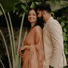 A candid and happy moment from an engagement shoot, capturing the couple's genuine smiles and affection.