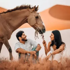 A whimsical pre-wedding moment shared with a friendly horse in a beautiful, rustic field. We are always open to your wildest location ideas to make your shoot truly one of a kind.