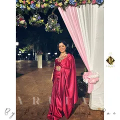 The full look of my pink satin saree and custom blouse at an evening event. I love the way the satin drapes and catches the light.