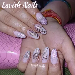 This elegant design features a soft pink base with silver glitter accents and beautifully detailed butterfly wing art for a touch of whimsy.