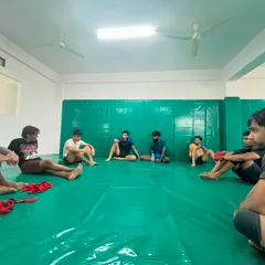 The team sits together after a roll. This is where we share insights, ask questions, and build the bonds that make us a strong unit.