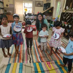 After learning about chameleons, the children created their own colorful chameleon crafts. This activity helps reinforce the story's theme of being happy with who you are.