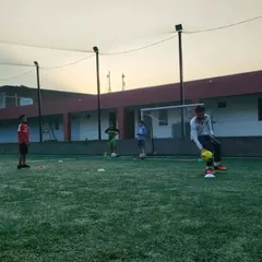A player practices his ball handling during a free camp. These sessions are designed to introduce fundamental skills in an engaging way for newcomers.