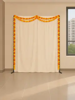 An illustration of a plain cream drape on a stand in a clubhouse hall, with a few strings of artificial orange and yellow flowers along its top and down its sides