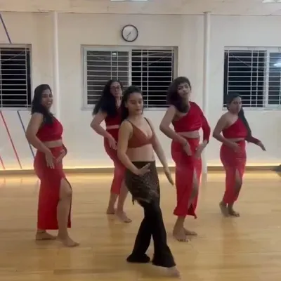 A snapshot from our beginner friendly Bollywood fusion course. Here, our instructor Madhu leads the class through a fun routine, creating a comfortable space for new dancers to explore movement.