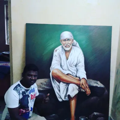 This realistic portrait of Sai Baba was hand-painted on a large canvas, capturing a serene and powerful presence. We take great care in creating respectful and detailed spiritual artwork.