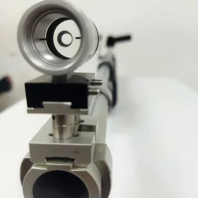 A close up view through the rear diopter sight of a competition air rifle. Perfect sight alignment, as seen here, is the key to placing a shot directly in the bullseye.