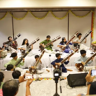 A view from the audience at our Gurupoornima concert. Parents and friends gather to watch the students showcase the skills they have developed over the year, creating a truly encouraging atmosphere for these young performers.