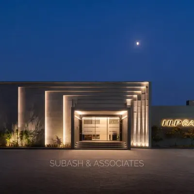 The HLP Galleria project at dusk, where architectural form and strategic lighting combine to create a striking brand statement. This facade demonstrates our philosophy of using clean, geometric lines to build a powerful and memorable commercial identity.