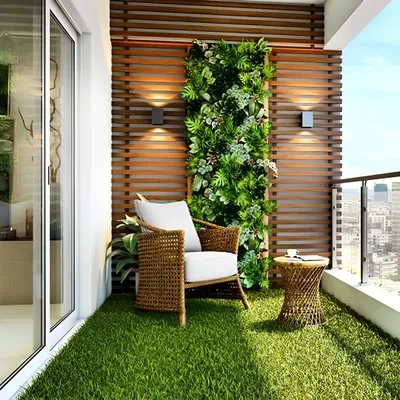 Even a small apartment balcony can become a personal retreat. Here, I used soft artificial grass, a comfortable wicker armchair, and a space-saving vertical garden mounted on a wooden slatted wall. This cozy balcony design provides a perfect spot for a morning coffee with a view.