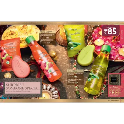 A festive Diwali-themed spread for Oriflame's Love Potion and Love Nature body care products. The layout integrates products, pricing, and festive elements like diyas and flower petals.