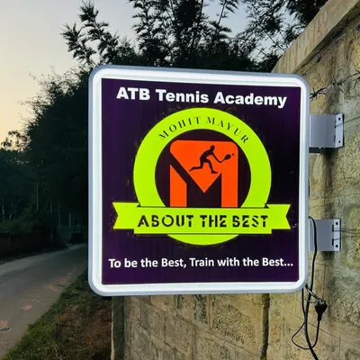 The official sign for our academy, ATB Tennis Academy, located in the serene environment of Yelahanka, Bangalore.