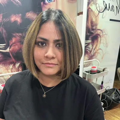 This is the result of a haircut correction. Ankita's previous bob was uneven, so I reshaped it into this beautifully layered and angled inverted bob that she originally wanted.
