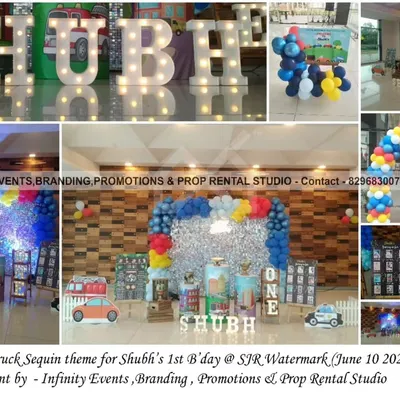A "Cars & Trucks" first birthday with a sparkling sequin theme. This setup for Shubh's party included a large balloon arch, light-up letters, and a custom milestone board, creating a high-energy celebration.