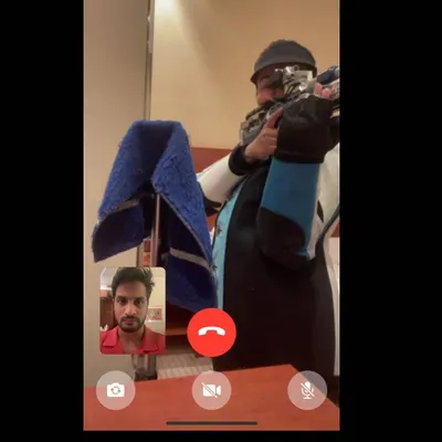 Even when apart, the training never stops. Our coach connects with an athlete via video call for a remote session, providing guidance on form and technique from afar.