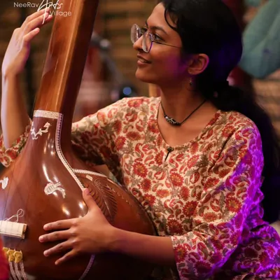 This image with the tanpura captures the essence of my classical training. I offer dedicated performances of semi-classical and devotional music that are perfect for creating a serene and traditional atmosphere.