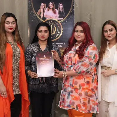 A proud moment for one of my students during our certification ceremony. She is now officially certified and ready to take on the beauty industry.