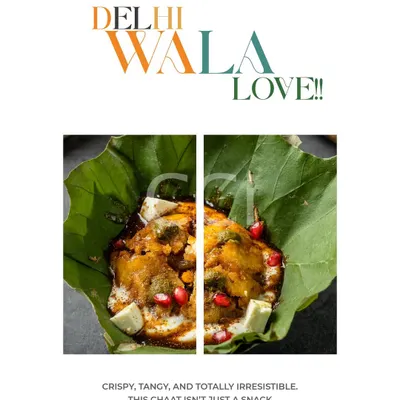 This is our "Delhi Wala Love" on a plate. A classic chaat, served in a traditional leaf bowl but elevated with fresh pomegranate seeds and paneer, capturing the crispy, tangy, and irresistible flavors of Delhi street food.