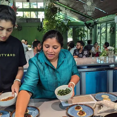 Here I am with my team, carefully plating dishes during a Christmas pop-up event. We focus on every detail to make sure the food is not only delicious but also beautifully presented.