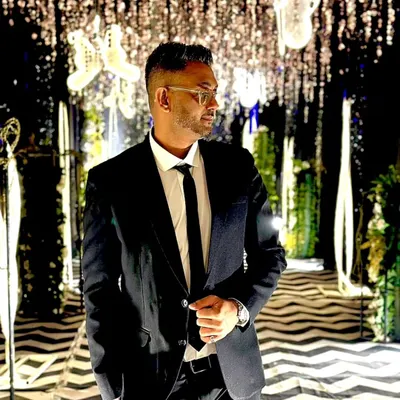 Dressed for a formal private event. I can adapt my style and music to fit any occasion, from a wild club night to a sophisticated corporate party.