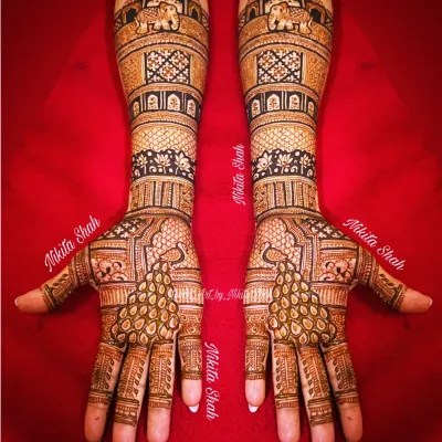 This is a full-coverage bridal mehendi for a client's relative, featuring majestic elephants and graceful peacocks. I specialize in creating these dense, traditional Indian designs that are perfect for the main family members at a wedding.