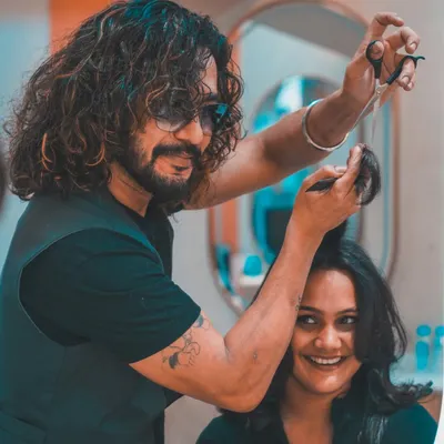 Meet one of our master stylists at work. We pride ourselves on the artistry and passion our team brings to every single client, ensuring a personalized and expert experience.
