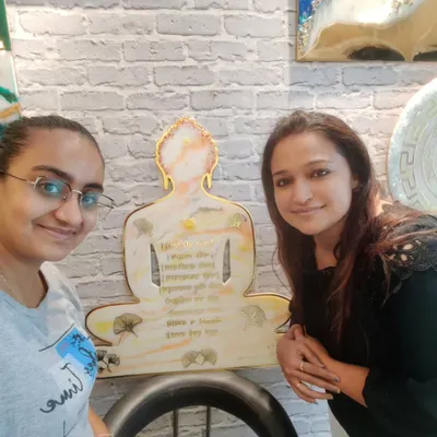 So much gratitude! I am pictured here with my student and the beautiful Resin Navkar Mantra wall decor she made for her new home during our one-on-one session.