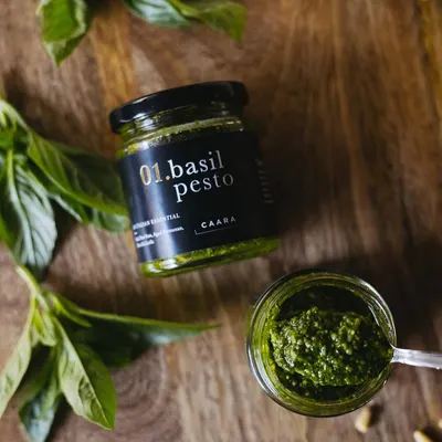 Our signature Basil Pesto, the product that started it all. We harvest fresh basil from our own farm to create this vibrant, flavourful pesto, perfect for pasta, sandwiches, or as a delicious dip.