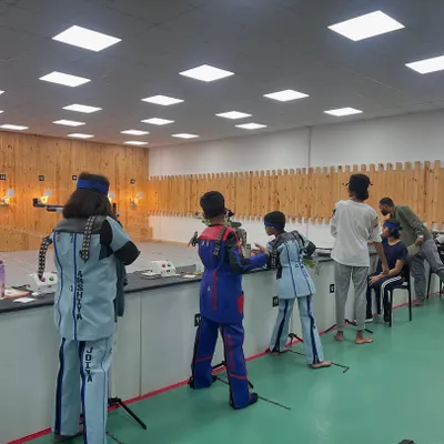 A typical weekend match at our facility. Here, shooters across different age groups and disciplines, including air rifle and air pistol, practice under real match conditions to sharpen their skills.