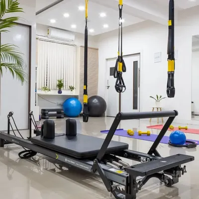 Welcome to my PhysioPilates studio. It is equipped with a Reformer, TRX suspension trainers, stability balls, and other props to provide a comprehensive and tailored movement experience for both private and group sessions.