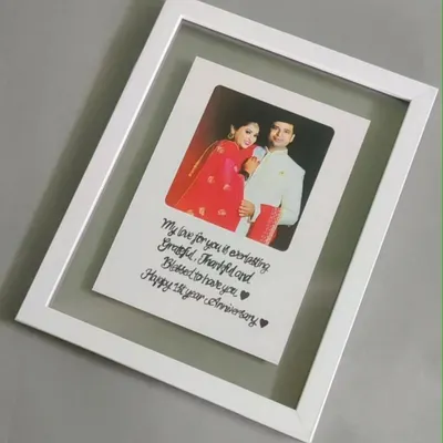 My signature floating acrylic frame is a customer favorite. Your photo and a custom handwritten message appear to float inside the clean white frame, making it a perfect anniversary or wedding gift.