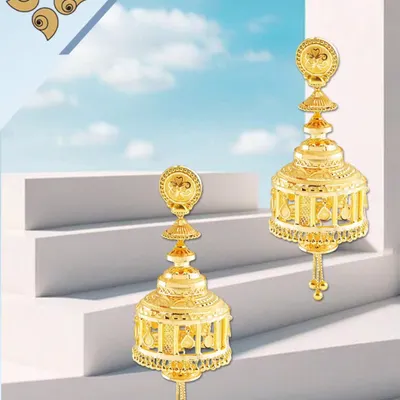 Exquisite Gold Jewellery Jhumkis from our house. These large, cage-style jhumkis feature intricate filigree work, making them a statement piece for any occasion.