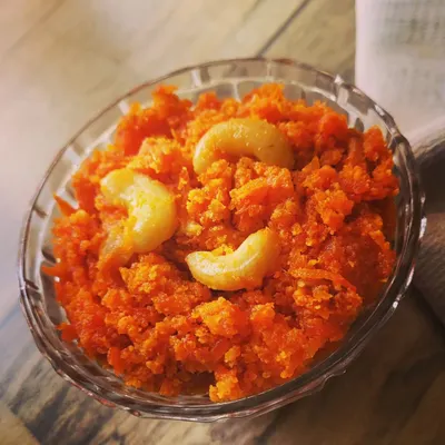 Winter isn't complete without a bowl of my homemade Gajar ka Halwa. This classic Indian dessert is made by slow-cooking grated carrots with ghee, milk, and sugar, and garnished with cashews.