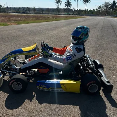 Pre-season testing is where championships are built. A driver takes a moment on the track at Meco Kartopia, preparing for an intense day of honing his skills in a Rotax powered kart.