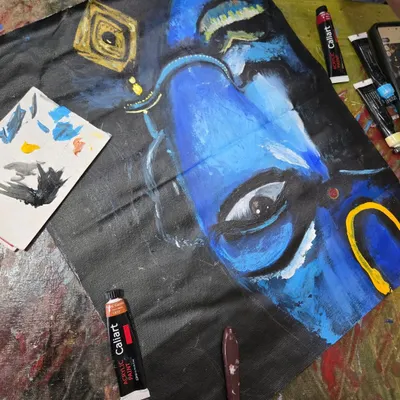 This powerful acrylic portrait demonstrates the expressive potential of bold colors and brushwork. Our painting classes help students explore color theory and application to create impactful pieces like this one.
