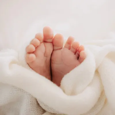 The ten tiniest toes. We take time in every newborn session to capture these precious details that you'll cherish forever.