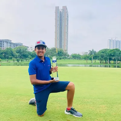 Siddhant Sharma holding his trophy at the IGU NCR Cup. A score of -11 against India's top juniors is a result of a disciplined process and a swing that holds up in competition.