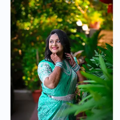 A beautiful candid portrait of the bride-to-be at her engagement ceremony, her happiness shining through.
